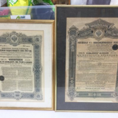 Six framed and glazed share certificates, one frame a/f. Shipping category D.