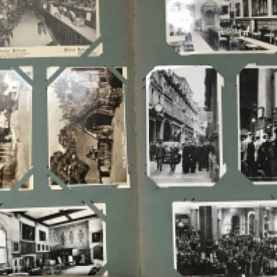 A collection of five albums of Vintage postcards including views of the London stock exchange and numerous other black and white and early coloured postcards (5)