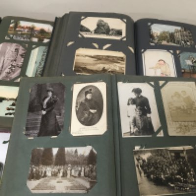 Three albums containing a comprehensive collection of Vintage post cards including social History comical cards places and landmark (3)