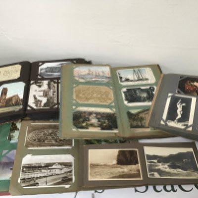 A collection of six postcard albums including some shipping cards and many others (6)