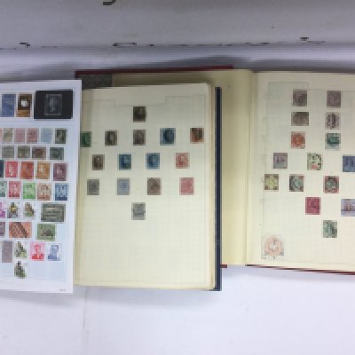 Seven albums of world stamps. Shipping category D.