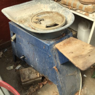 An electric clay potters wheel. Needs maintenance refreshing.