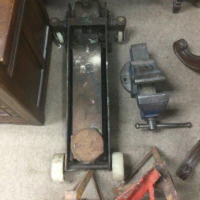 A car jack trolley and a vice . No Reserve.