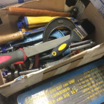 Two boxes of tools various and a proxxon drill .