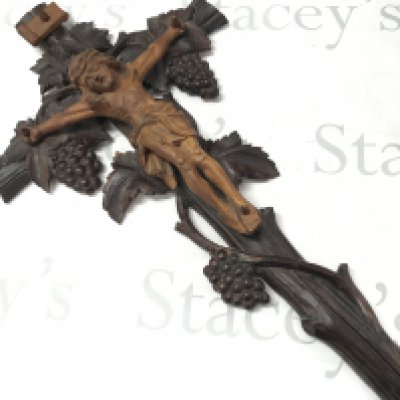 A Black Forest carved crucifix, 64cm tall postage cat B
