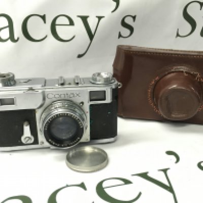 A Vintage Contax Zeiss Ikon camera with leather case . Postage category B