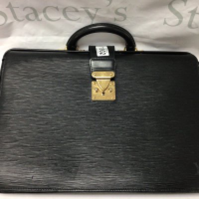 A Louis Vuitton brief case