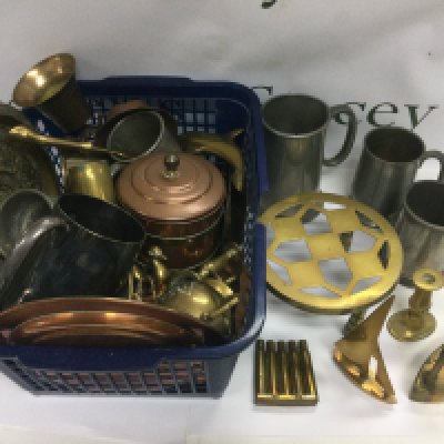 A collection of copper, brass and metalware comprising tankards, ornaments etc. shipping category D.