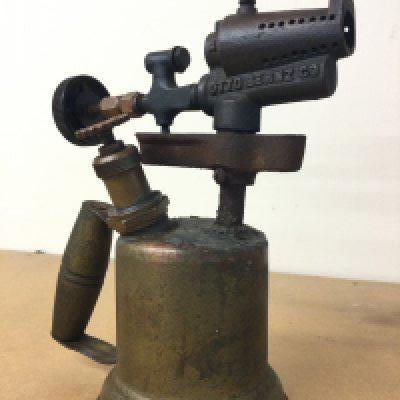 A very early blow lamp , 27cm tall postage cat B