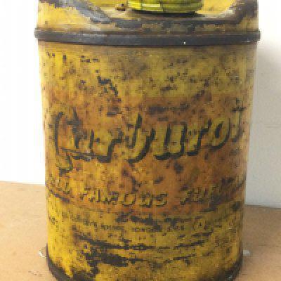 A rare early Carburol round tin, 24cm tall. Postage cat c