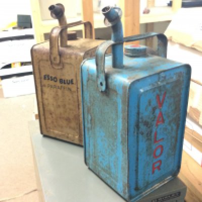 A vintage 1 gallon Esso blue paraffin can and a 1 gallon Valor Paraffin can . Postage category C