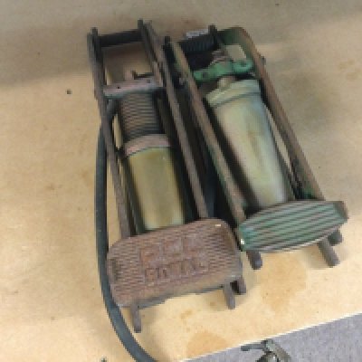 Two vintage car tyre pumps , postage category B