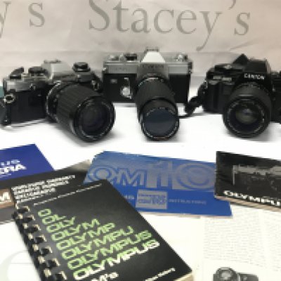 Three vintage SLR cameras, Olympus , Centon. Postage cat C