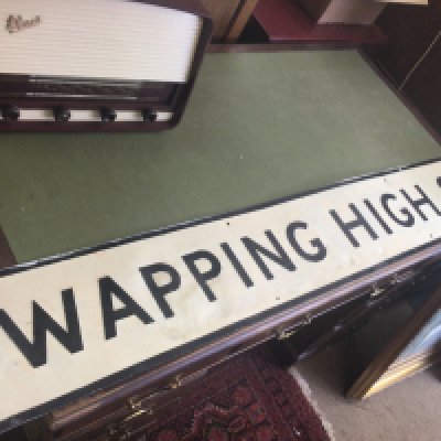 A vintage Wapping High London street sign