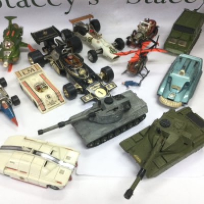 WITHDRAWN Four boxes of various playworn and boxed die cast vehicles including Chitty Chitty Bang Bang, Bat copter, UFO SHADO vehicles, tanks, F1 cars etc. Includes Corgi and Dinky examples. Shipping category D.