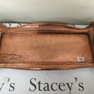 A Quality Art nouveau hand hammered copper tray of rectangular shape with raised sides and of rectangular shape. 66cmx 30cm