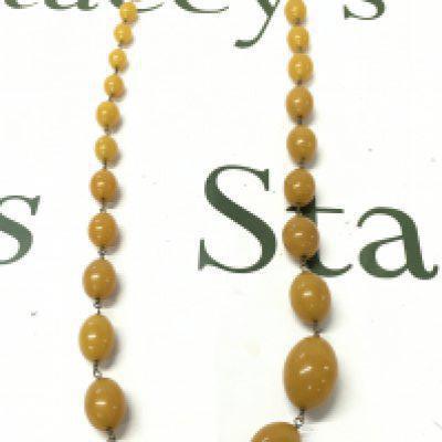 Bakelite and silver colour necklace , 84cm long. 95g total weight