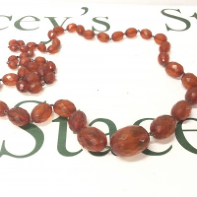 A Large Faceted Baltic Amber Necklace, 100cm 100g