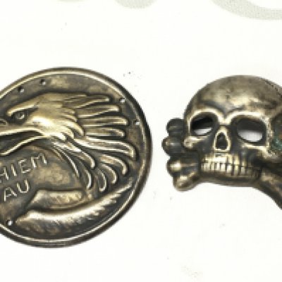 German Bavarian volunteer Freikorps medal and a SS skull hat badge . Postage category A