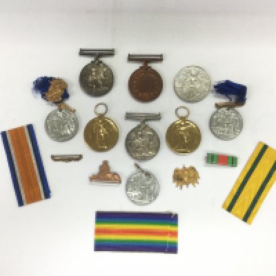 A small group of WW1 medals and ribbons. Shipping category A.