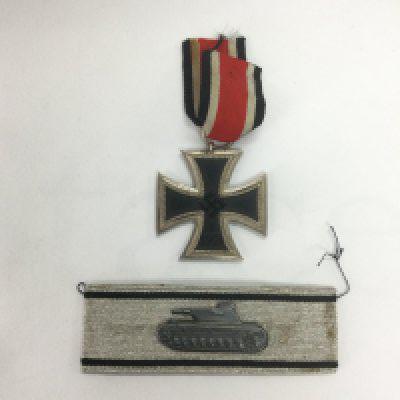 A WW2 German iron cross and a tank battalion badge (2). Shipping category A.