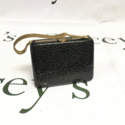 An unusual vintage bag compact. NO RESERVE