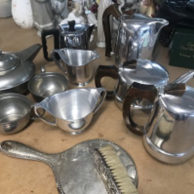 Three tea sets including pewter and picquet ware . Hand mirror and brush. NO RESERVE