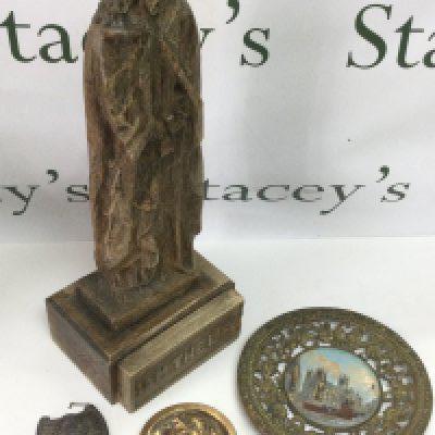 A carved wooden figure of Jesus Christ, a bronze circular plaque of a lady in profile etc. Shipping category D.