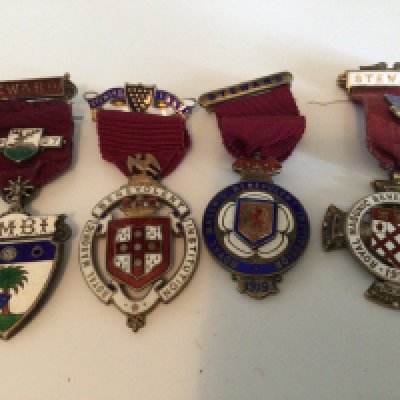 A collection of eight silver and enamel Stewards Jewels with dates of 1919 and other dates 1920-30. (8)- NO RESERVE