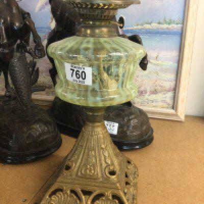 A Edwardian oil lamp with opaque font .