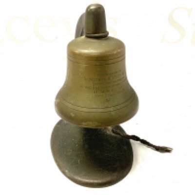A small cast bronze desk bell and stand presented to Alderman W. Miles O.B.E (ref lot 701) for the occasion of landing H.M.M.E 387 July 1943. H.18cm