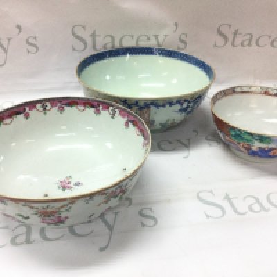 Chinese bowls including a Famille Rose Canton bowl, Famille Rose punch bowl (damaged with chips, hairline cracks and restoration) and another punch bowl decorated with figures. Dimensions ranging from 9cm tall 19cm wide to 12cm tall 28cm wide