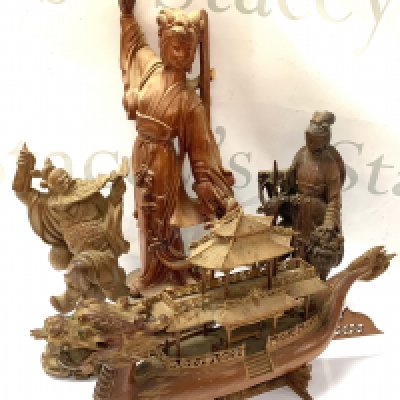 3 Carved Chinese figures of deity&rsquo;s together with a carved Chinese dragon boat