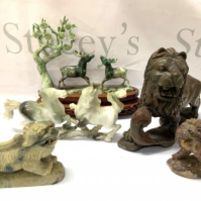 A collection of carved soapstone, Jade, Jadeite oriental figurines.
