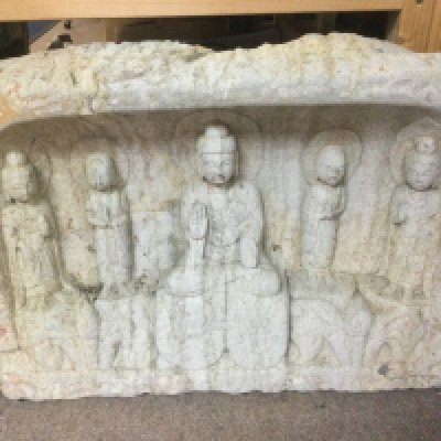 A Chinese stone cut plaque of buddha and disciples, approx 62cm x 44cm. Shipping category D.