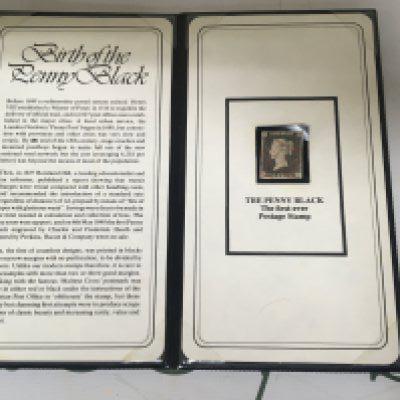 An 1840 Victorian penny black back stamp with red Maltese cross good margins in a black presentation wallet with stamp history.