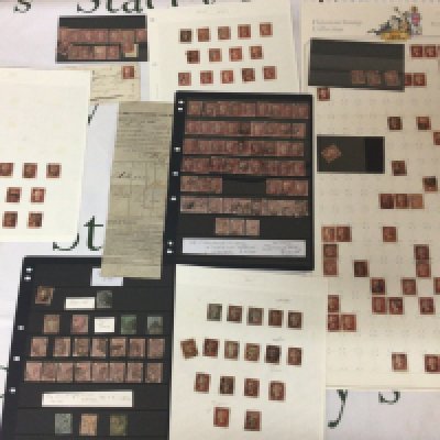 A collection of Victorian penny red stamps including a section of a Yorkshire Railway notice arrival of goods and other used Victorian penny and other stamps.