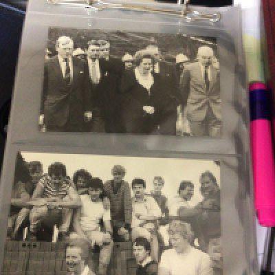 A collection of albums of first day covers postcards cigarette cards and photos. Including a an album of 1970s Isle of Man first day covers.