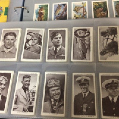 Five well presented albums of Vintage Cigarette cards and other cards. Including Vintage Ogdens Football captions other football cards Wills Aviation 1950s cricketers Turf race horses Churchmans racing Greyhounds and many others.