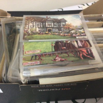 A box containing mixed Vintage postcards Tuck Post Cards C W Faulkerner cards and many others and a box containing modern mixed collectors cards including American cards Greatest Olympians and many others. Including football cards. (2)