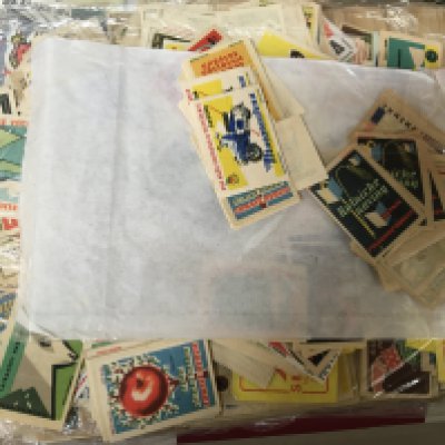 A box containing mixed ephemera including vintage Tuck postcards a box Containing Vintage French and Continental cards other cigarette and collectors cards and much more.