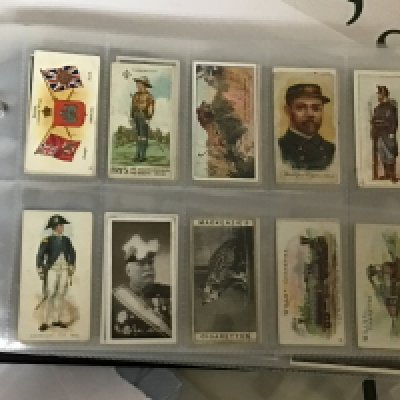 Six albums containing a good collection of Vintage cigarette cards and including an album containing match box covers. The Vintage cigarette cards including a few Taddy &Co Series One Admirals & Generals. Large size Richard Benson Cards Early Ogdens cigarette cards and many more (6)