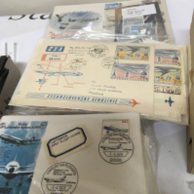 A box containing Aviation First Flight stamp covers aviation presentation stamp packs and other stamps