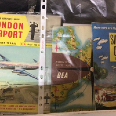 A Box containing an intresting comprehensive collection of ephemera The Modern History of Southend Airport including photographs news paper cuttings and also two Concorde flight pouches containing notebooks and a tie.