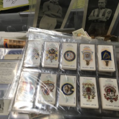 A box containing an extensive collection of vintage cigarette cards and other trade cards and some postcards.