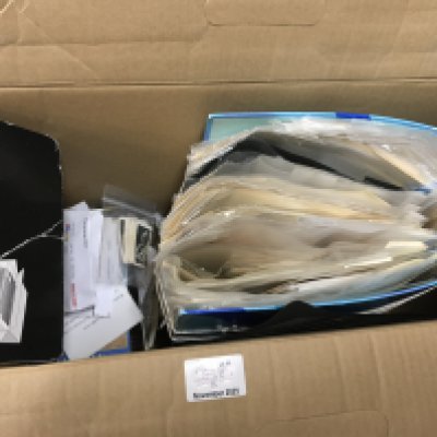 Two boxes containing mixed vintage cigarette cards and other related ephemera.